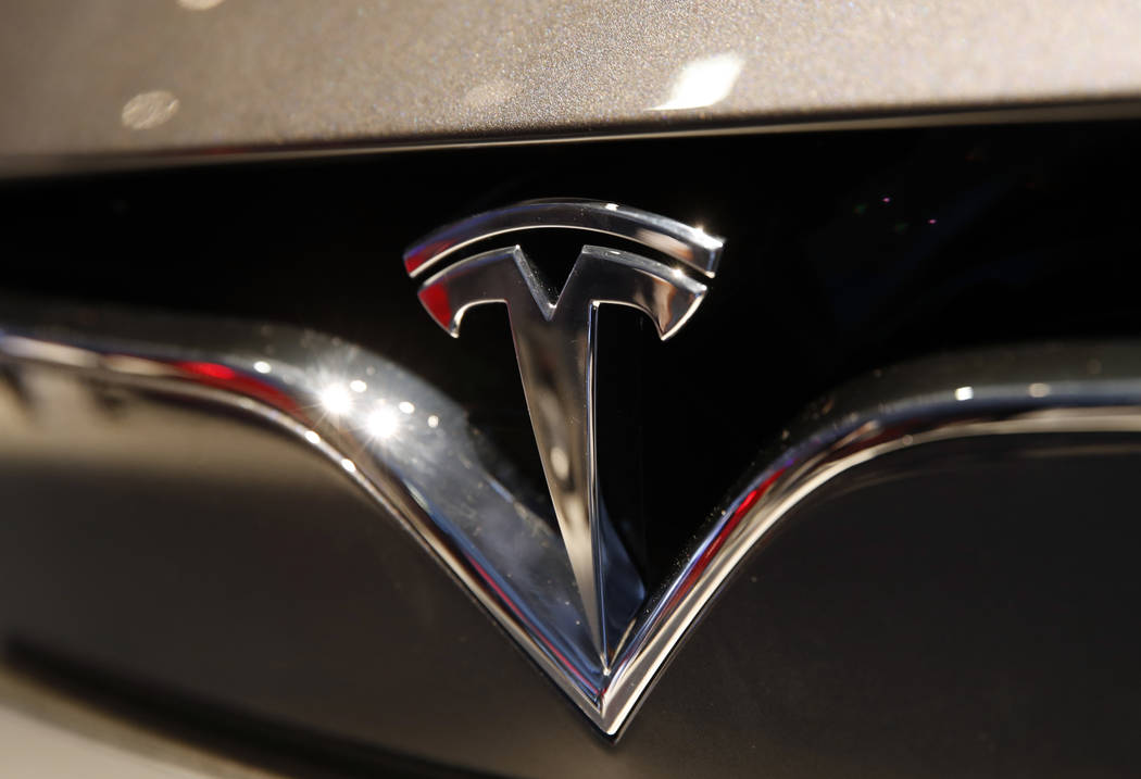 A Tesla emblem at the Auto show in Paris on Oct. 3, 2018. Tesla CEO Elon Musk appears poised to ...