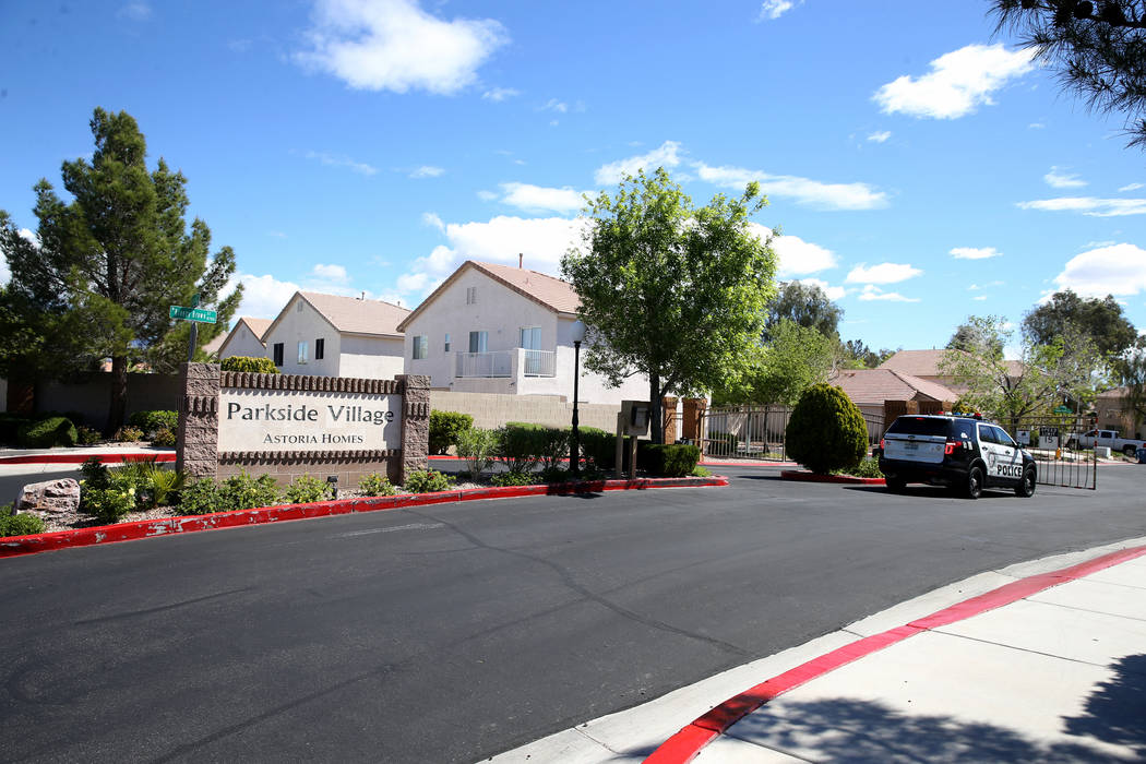 Las Vegas police investigate a homicide in a gated community near near North Durango and West G ...