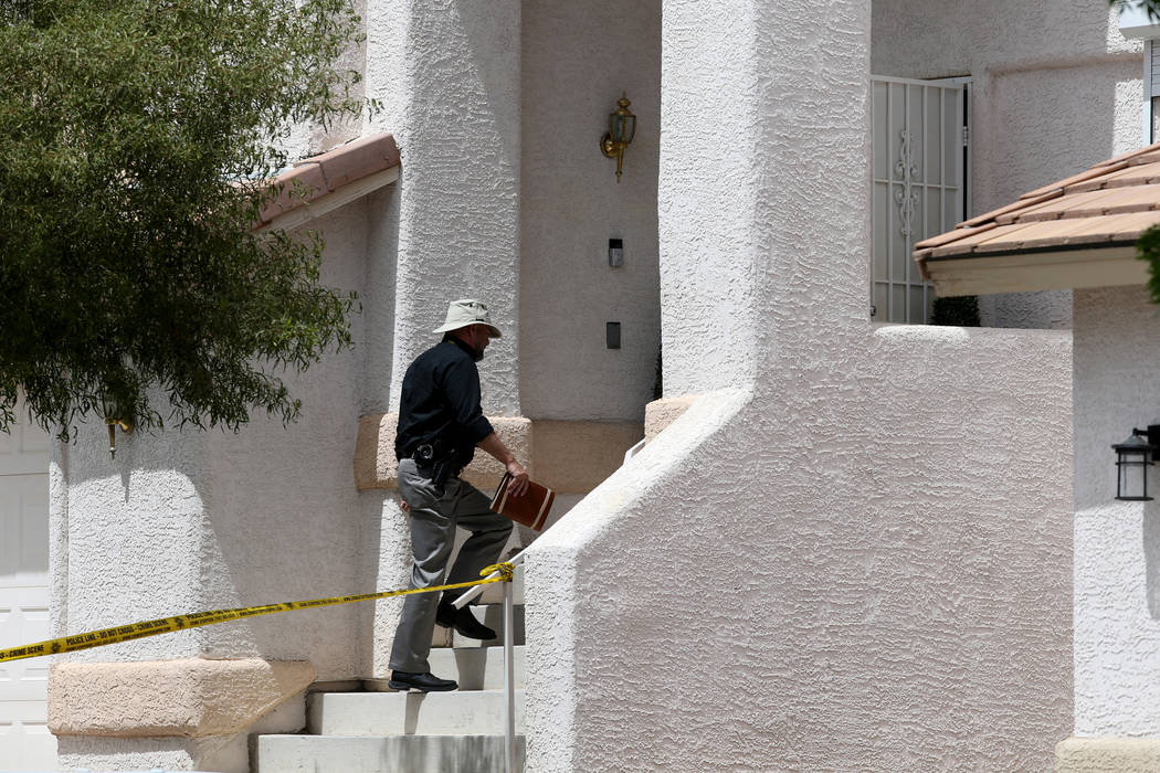 Las Vegas police investigate a homicide in a gated community near near North Durango and West G ...