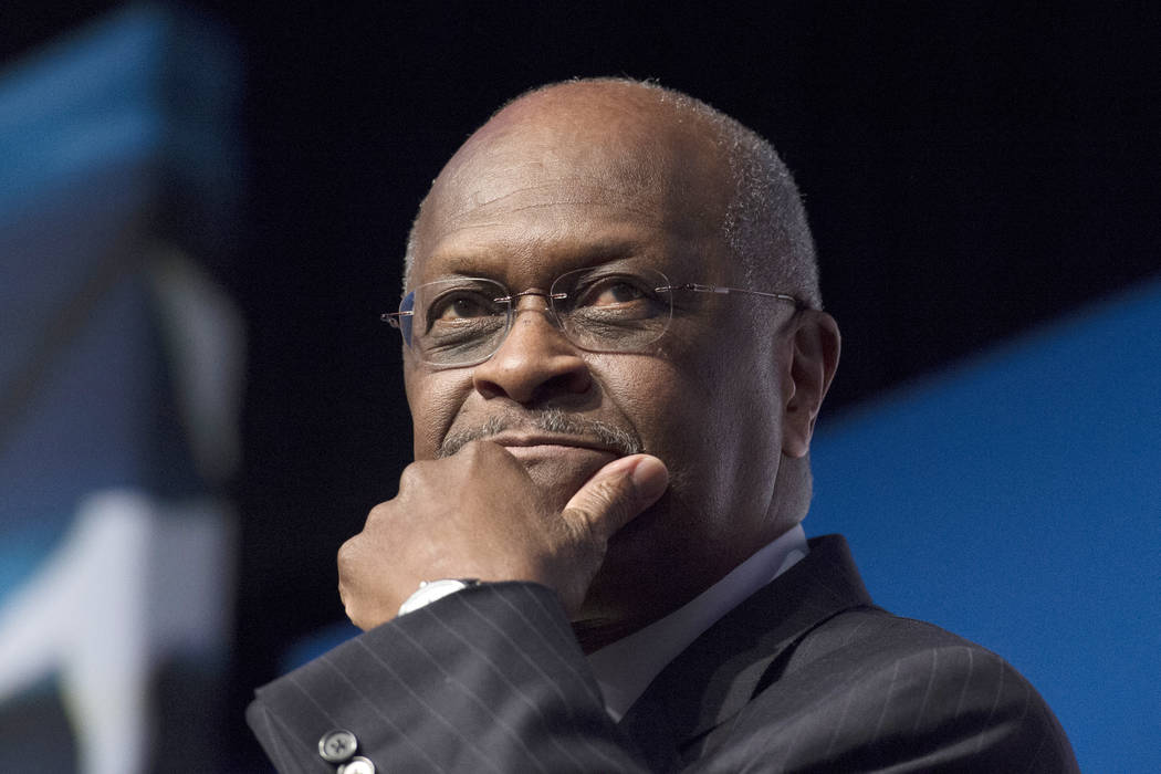 Herman Cain speaks during Faith and Freedom Coalition's Road to Majority event in Washington on ...