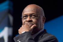 Herman Cain speaks during Faith and Freedom Coalition's Road to Majority event in Washington on ...