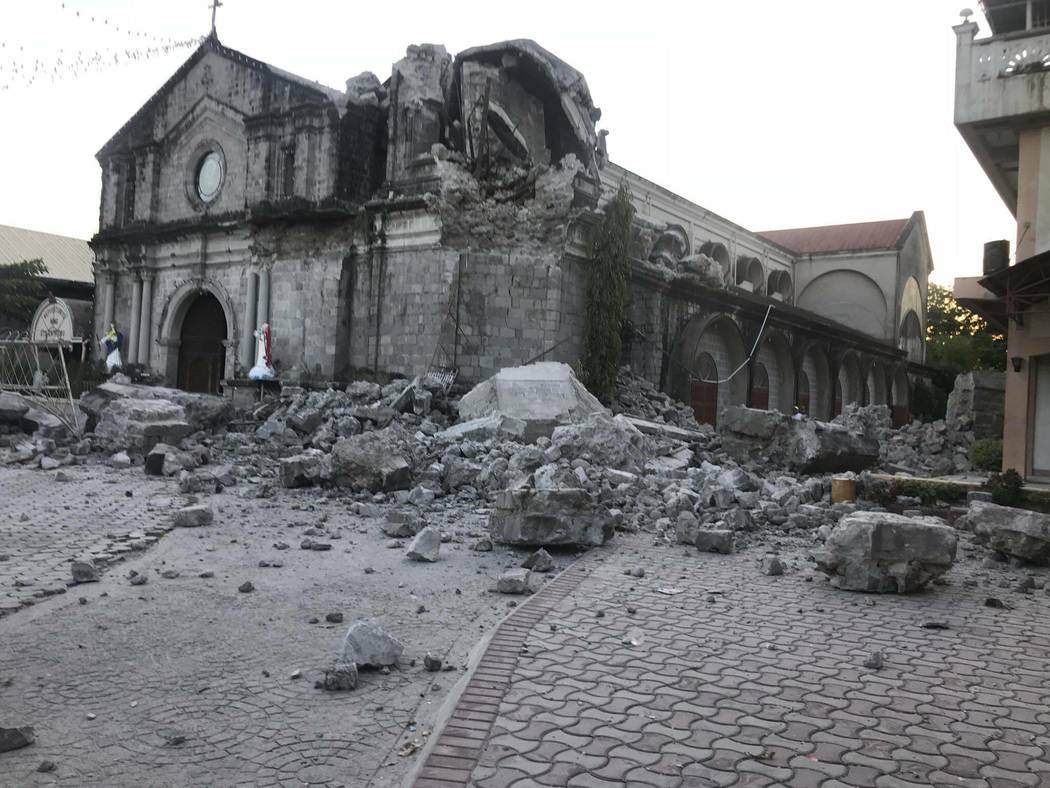 The St. Catherine church is damaged after an earthquake struck Porac town, Pampanga province, n ...