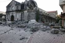 The St. Catherine church is damaged after an earthquake struck Porac town, Pampanga province, n ...