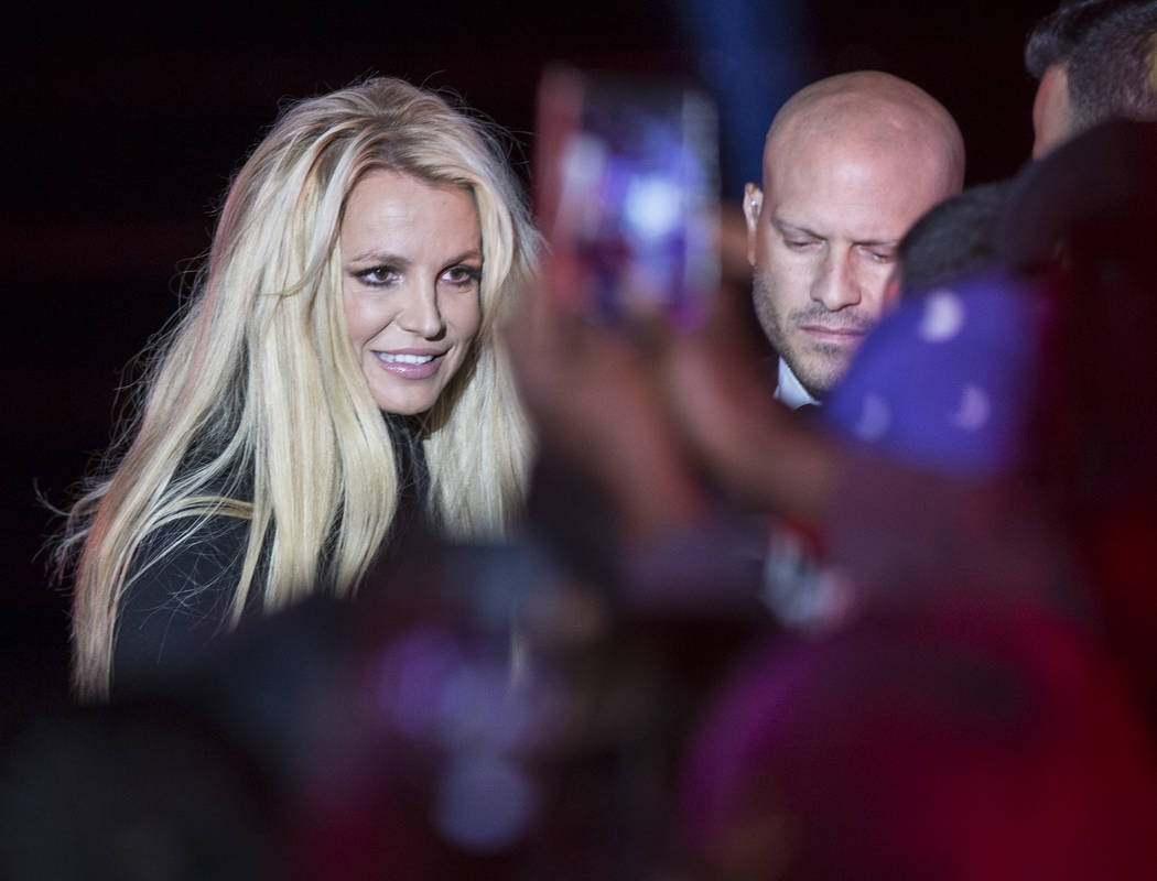 Britney Spears signs autographs during an event to announce her new residency at The Park Theat ...