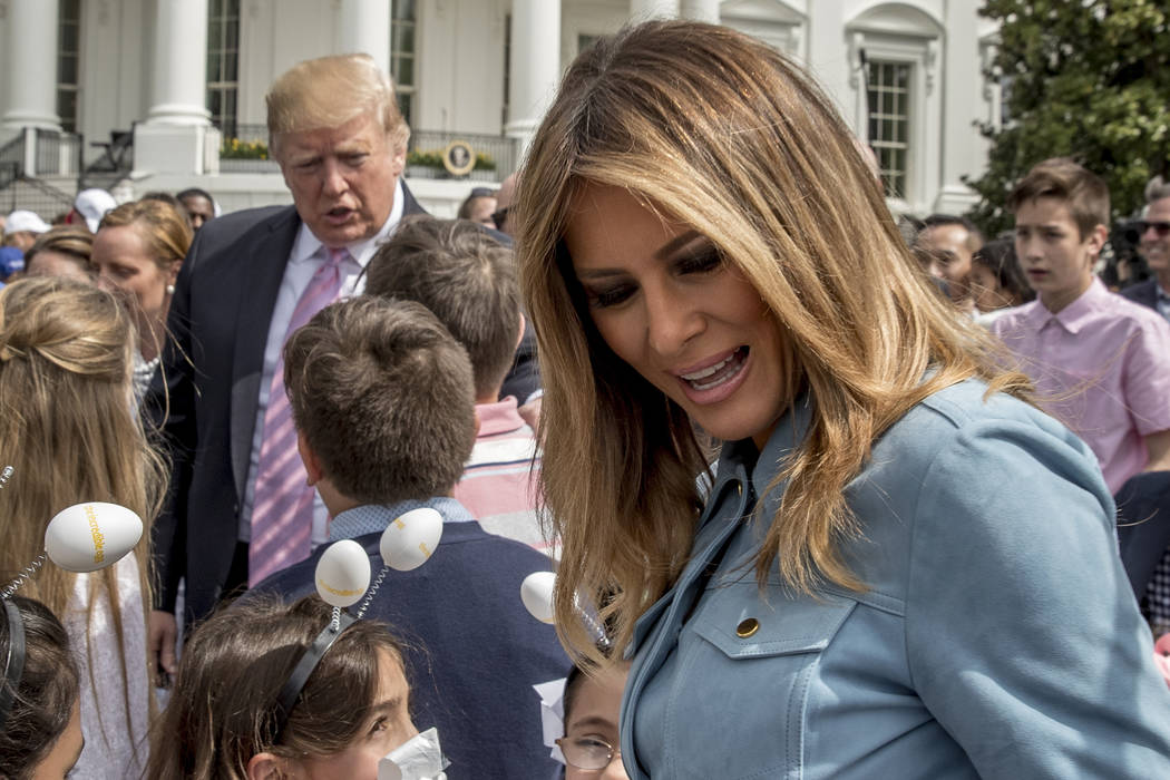 President Donald Trump and first lady Melania Trump greet children during the annual White Hous ...