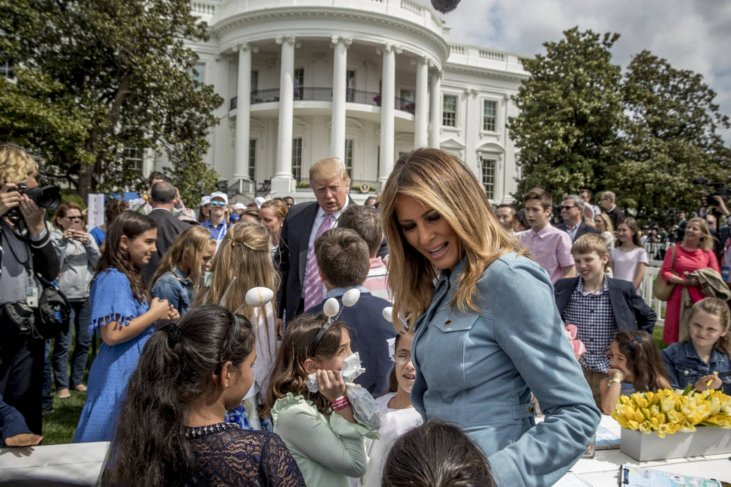 President Donald Trump and first lady Melania Trump greet children during the annual White Hous ...