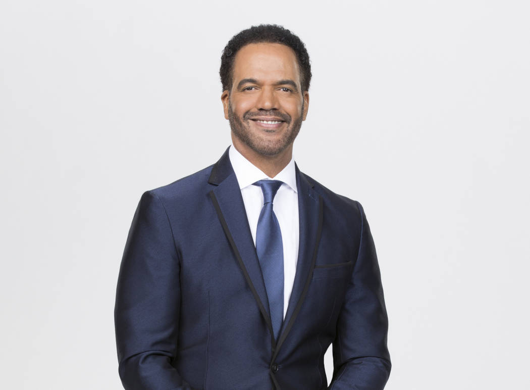 This image released by CBS shows Kristoff St. John who portrays Neil Winters on the CBS series ...