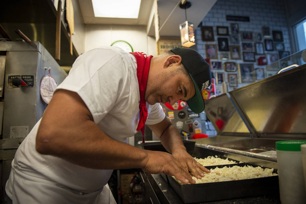 Vincent Rotolo prepares Detriot-style pizzas at Good Pie at Pawn Plaza in Las Vegas, Thursday, ...