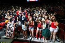 UNLV Rebels fans in the student section cheer during the second half of a basketball game again ...