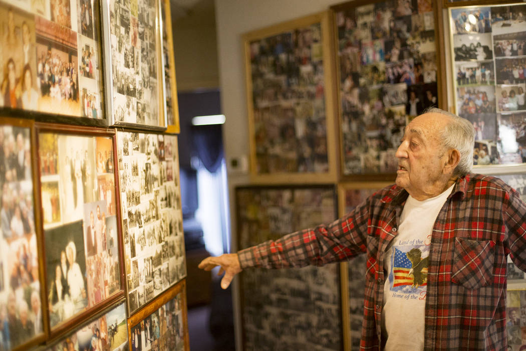 Onofrio "No-No" Zicari, 96, shows the Review-Journal photos of his time in World War ...