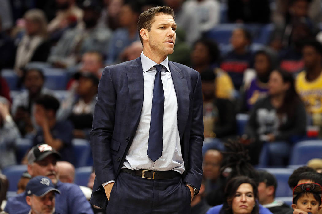 Los Angeles Lakers head coach Luke Walton during the first half of an NBA basketball game in Ne ...