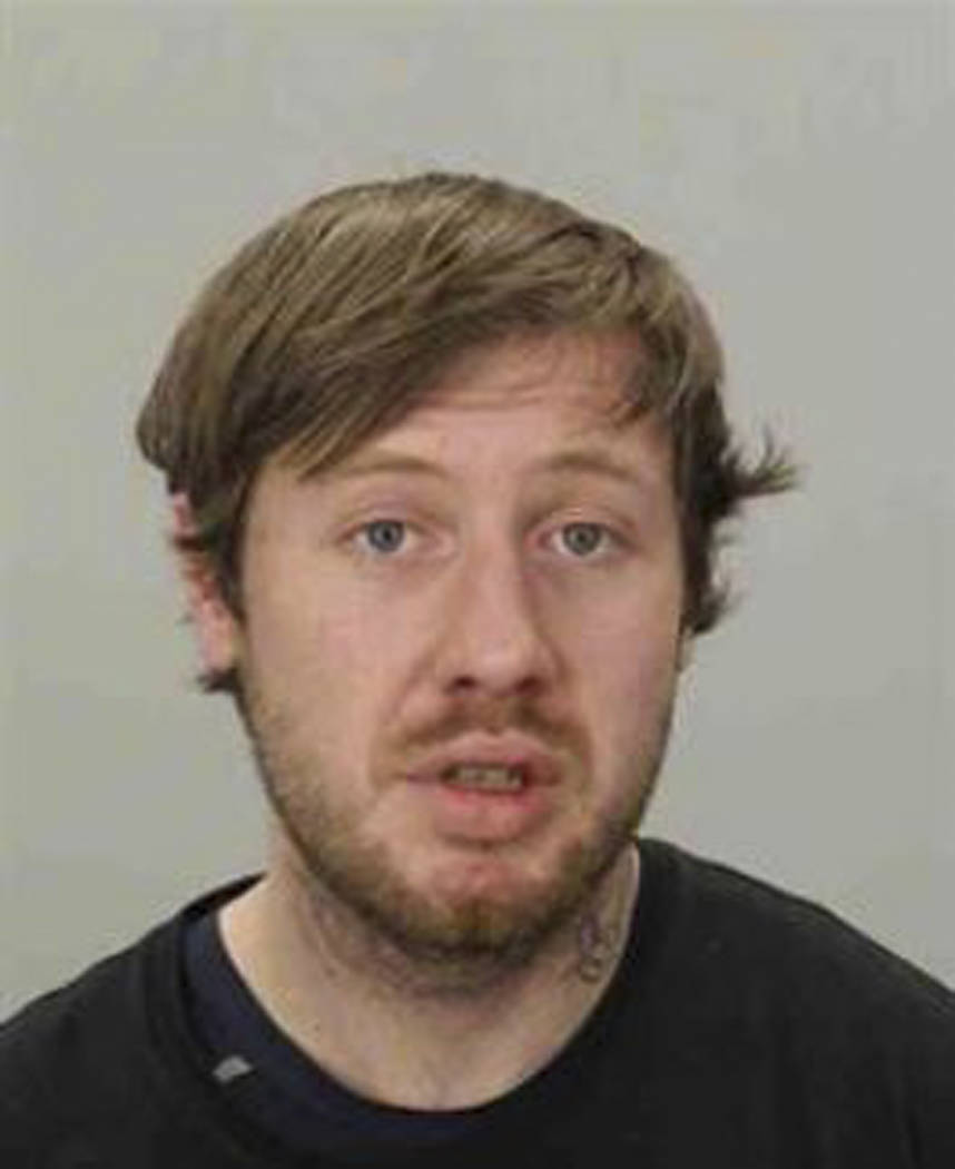 This undated photo, provided by the Coos County Sheriff's Office, shows Devin J. Wilson. A poli ...