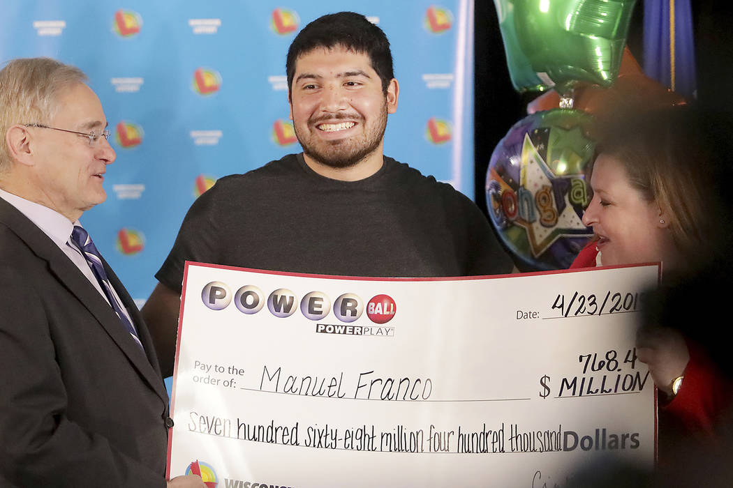 Manuel Franco of West Allis, Wis., winner of second-highest Powerball lottery in history, atten ...