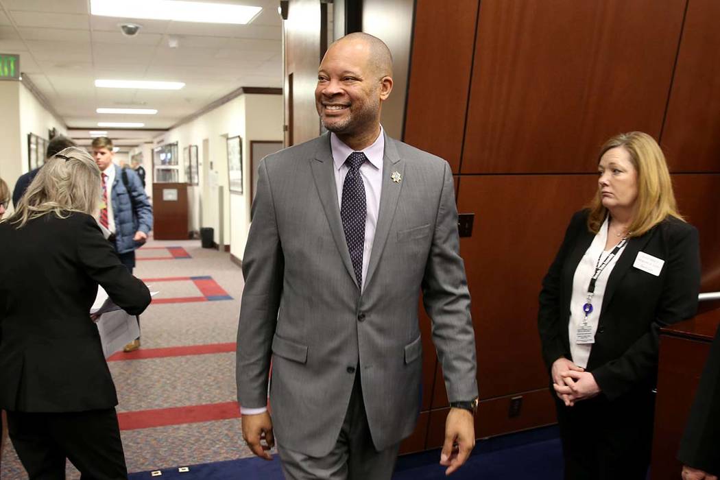 Attorney General Aaron Ford walks into the Assembly chamber on the first day of the 80th sessio ...