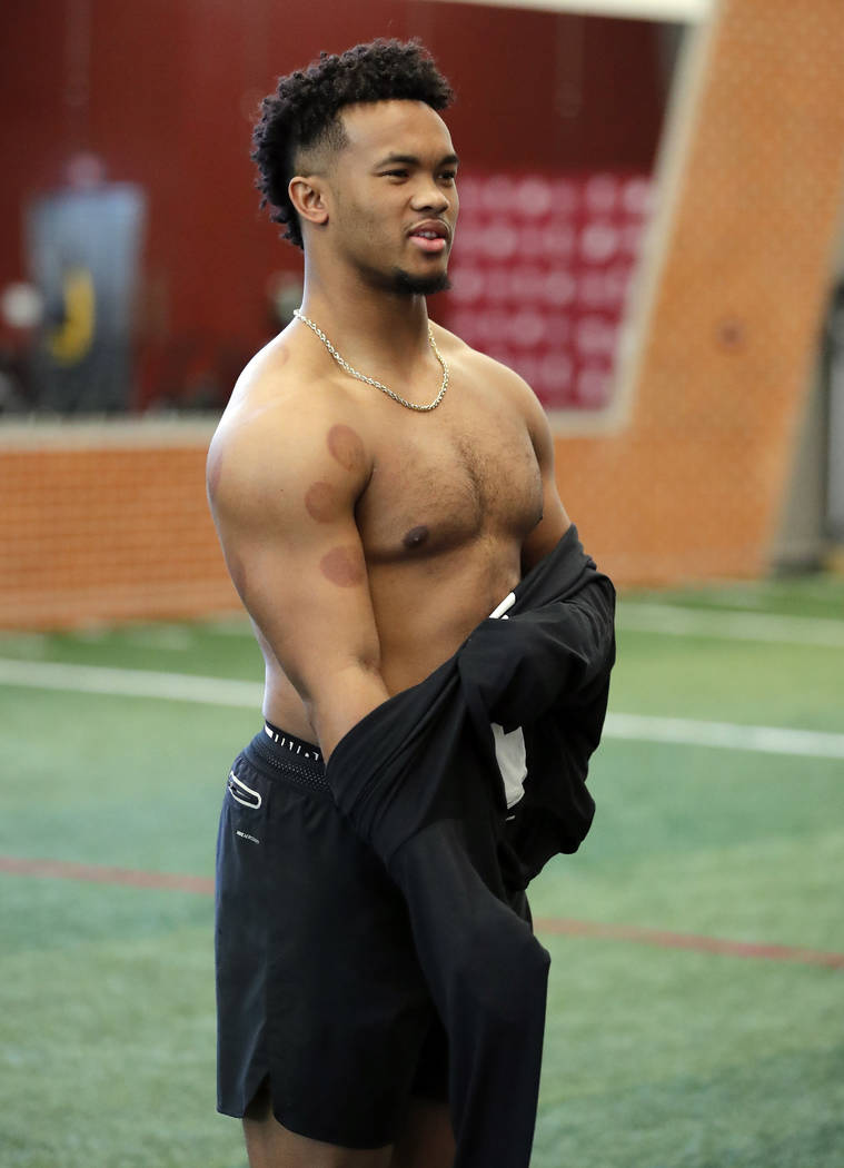 Oklahoma quarterback Kyler Murray prepares to go through drills at the university's Pro Day for ...