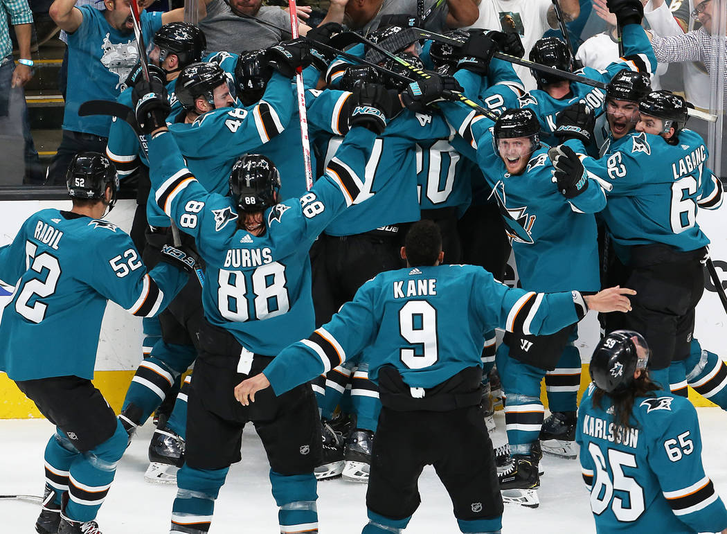 The San Jose Sharks celebrate after right wing Barclay Goodrow scored the game winning goal in ...