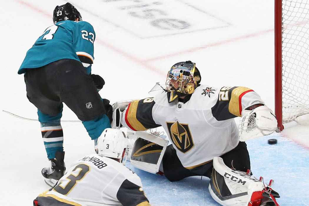 Sharks right wing Barclay Goodrow (23) scores against Knights goaltender Marc-Andre Fleury (29) ...