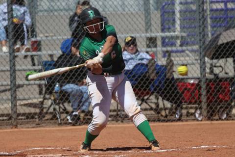 Rancho's Liliana Gutierrez (6) hits the ball for a solo homer against Desert Oasis in the softb ...