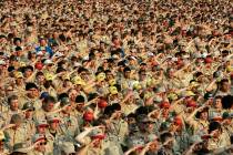 Boy Scouts salute as they recite the Pledge of Allegiance July 31, 2005, during the Boy Scout J ...