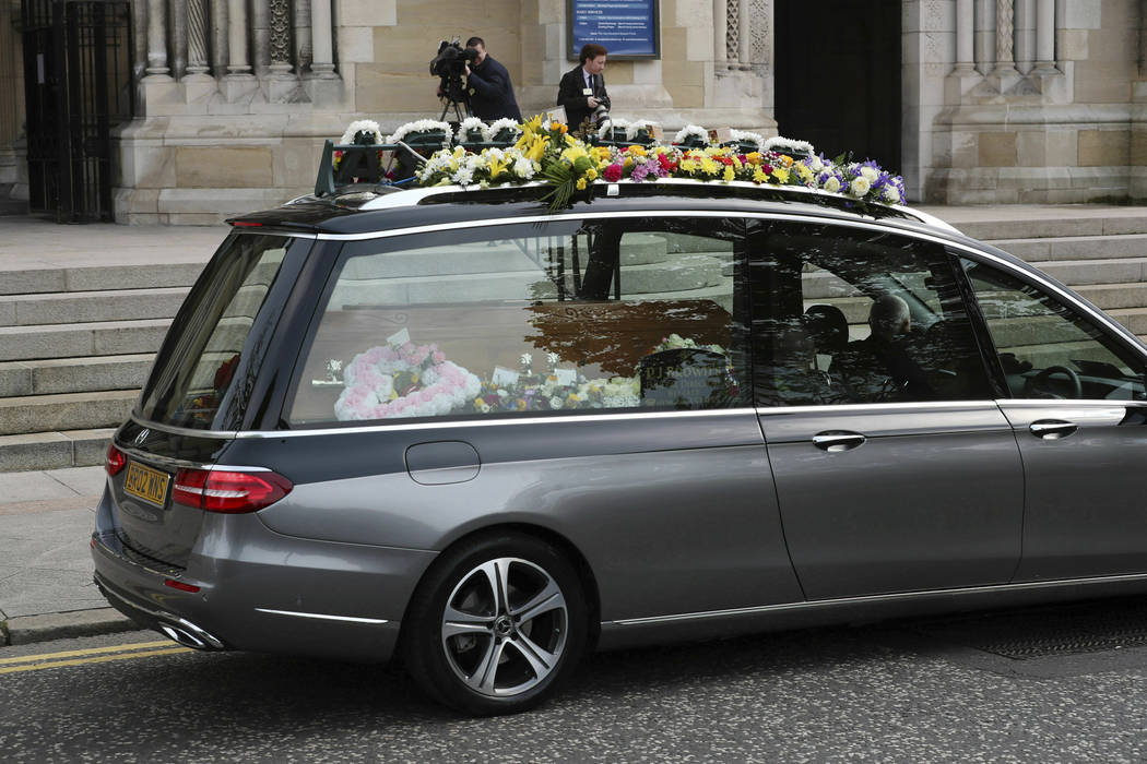 The hearse carrying the body of journalist Lyra McKee arrives at St Anne's Cathedral in Belfast ...