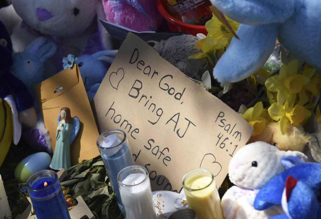 A makeshift memorial grows Monday, April 22, 2019 outside the Dole Avenue home of Andrew " ...