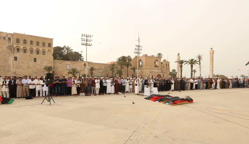 Mourners gather for funeral prayers for fighters killed by warplanes of Field Marshal Khalifa H ...