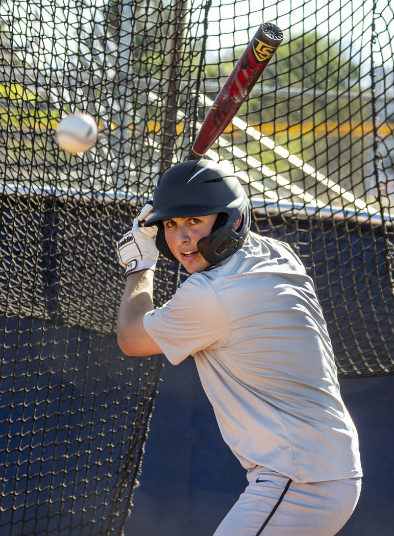 The Meadows School third baseman Sam Kaplan eyes a pitch during hitting practice, he will play ...