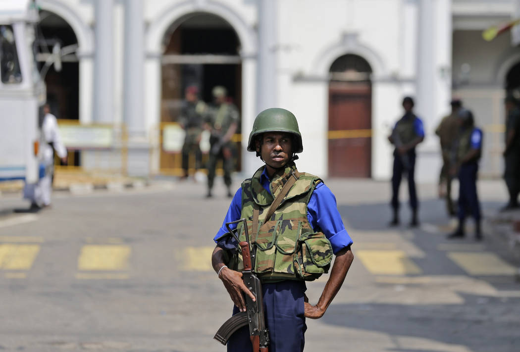 Sri Lankan navy soldiers secure the area out side St. Anthony's Church in Colombo, Sri Lanka, T ...