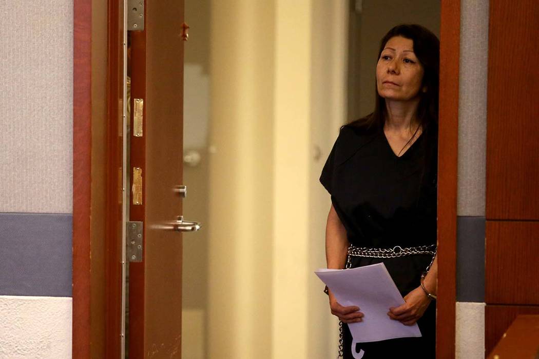 Retired Las Vegas police detective Pamela Bordeaux remains in a holding cell entrance outside t ...
