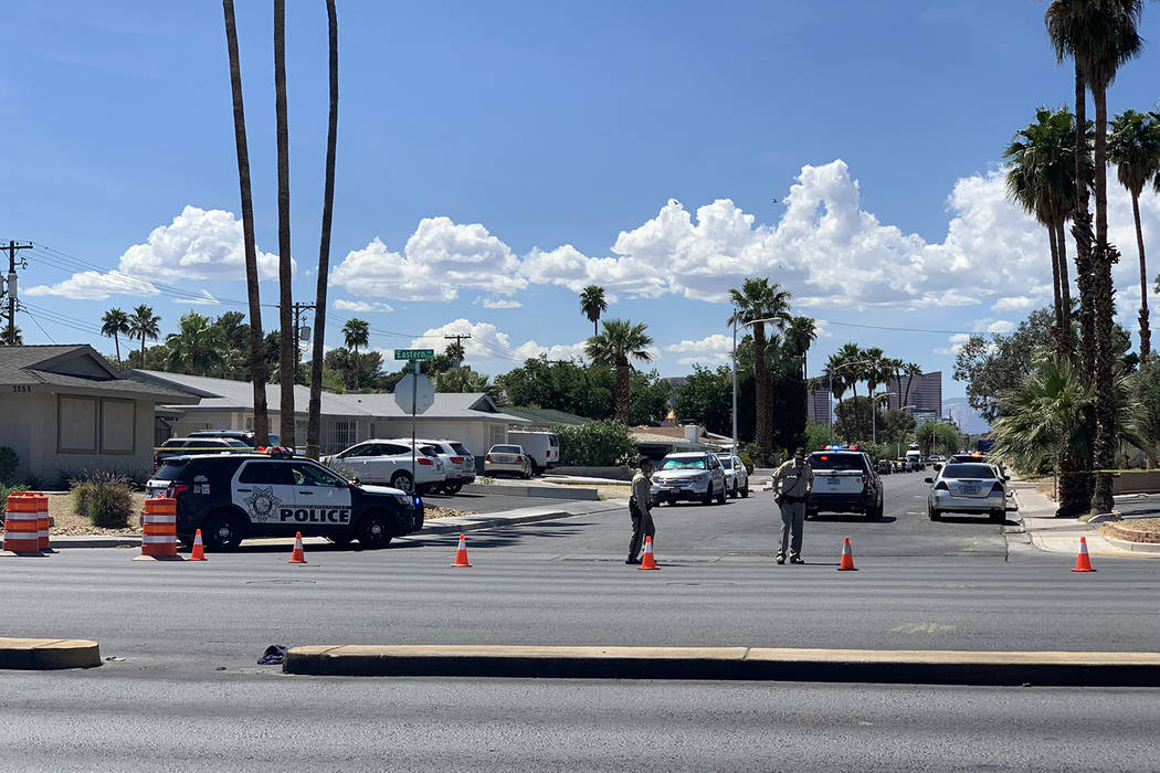 Las Vegas police and medical personnel respond to a shooting on the 3200 block of Silver Saddle ...