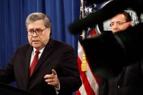 Attorney General William Barr speaks alongside Deputy Attorney General Rod Rosenstein about the ...