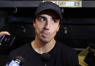 Golden Knights goalie Marc-Andre Fleury pauses as he addresses the media at City National Arena ...