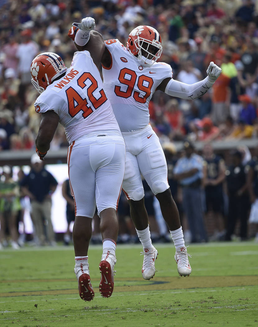 In this Sept. 22, 2018, file photo, Clemson defensive end Clelin Ferrell (99) and defensive lin ...