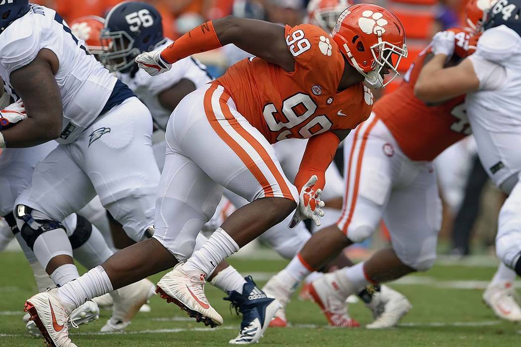 In this Sept. 15, 2018, file photo, Clemson's Clelin Ferrell (99) rushes into the backfield dur ...