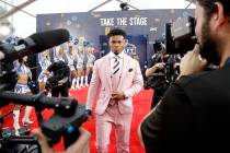 Oklahoma quarterback Kyler Murray walks the red carpet ahead of the first round at the NFL foot ...