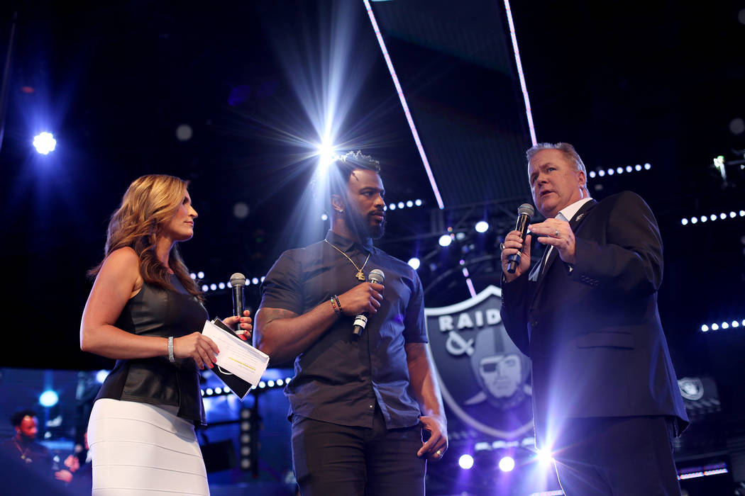 Nicole Zaluomis, host of The Silver and Black Show, and former Raiders player Marcel Reece, and ...