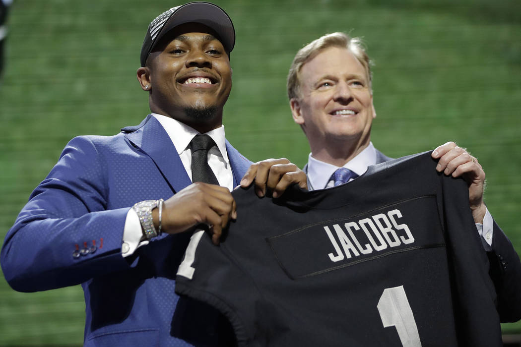 Alabama running back Josh Jacobs poses with NFL Commissioner Roger Goodell after the Oakland Ra ...