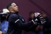 Former Mississippi State safety Johnathan Abram reaches for a pass during drills while getting ...