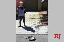 Brody Vanwagoner, 9, tries to fry an egg in front of his Summerlin home on Thursday, April 25, ...