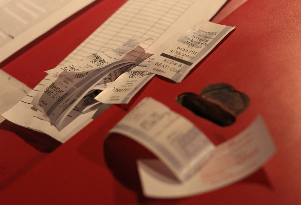 A pile of "Avengers: Endgame" tickets starts to pile up as moviegoers enter the first showing o ...