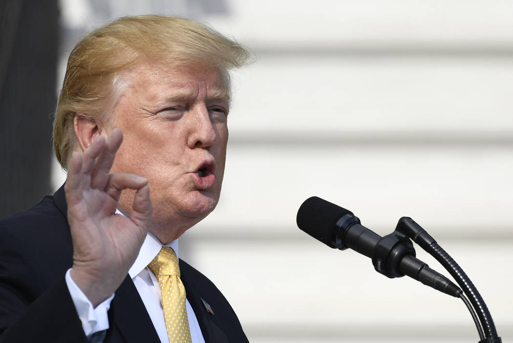 President Donald Trump speaks April 25, 2019, on the South Lawn of the White House in Washingto ...