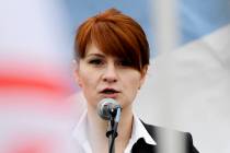 Maria Butina, leader of a pro-gun organization in Russia, speaks April 21, 2013, to a crowd dur ...