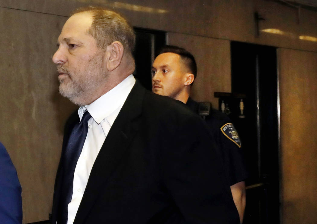 Harvey Weinstein enters State Supreme Court in New York, Friday, April 26, 2019. Both sides in ...