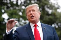 President Donald Trump speaks to the media as he departs the White House on Friday April 26, 20 ...