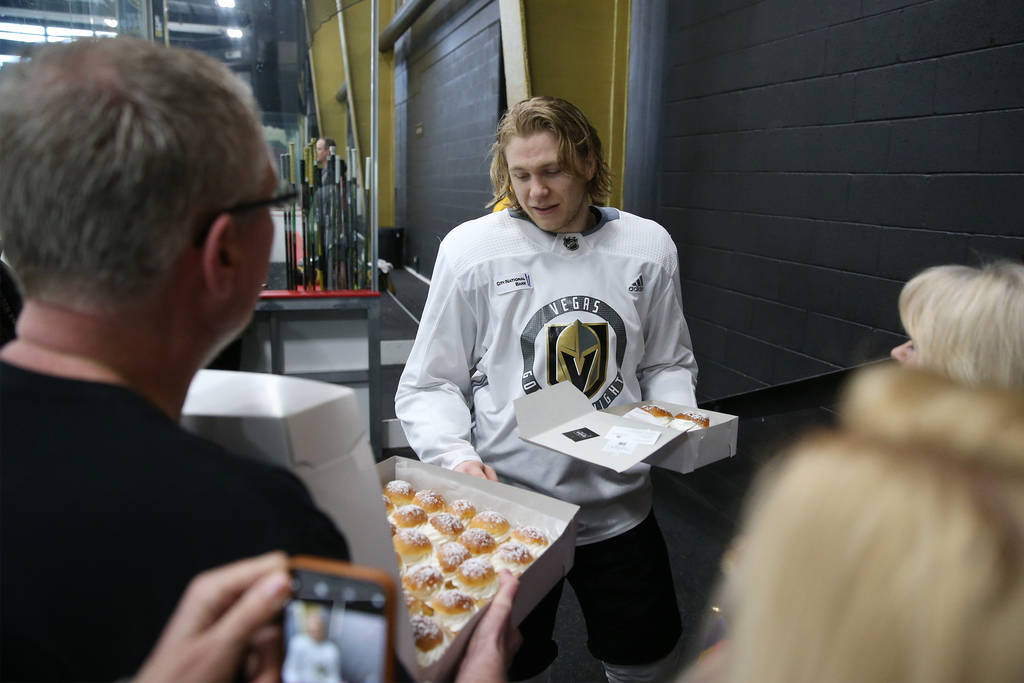 Vegas Golden Knights center William Karlsson (71) is presented with Swedish pastries made on Fa ...