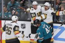 Golden Knights left wing Max Pacioretty (67) celebrates with teammates Mark Stone (61) and Paul ...