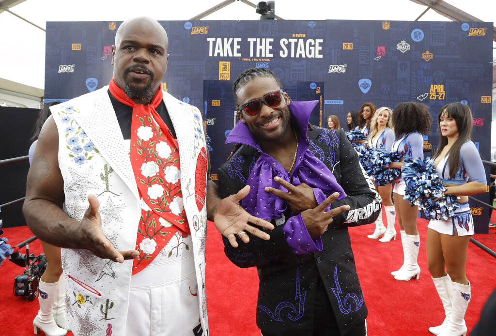 Vince Wilfork, left and DeAngelo Willimas walk the red carpet ahead of the first round at the N ...