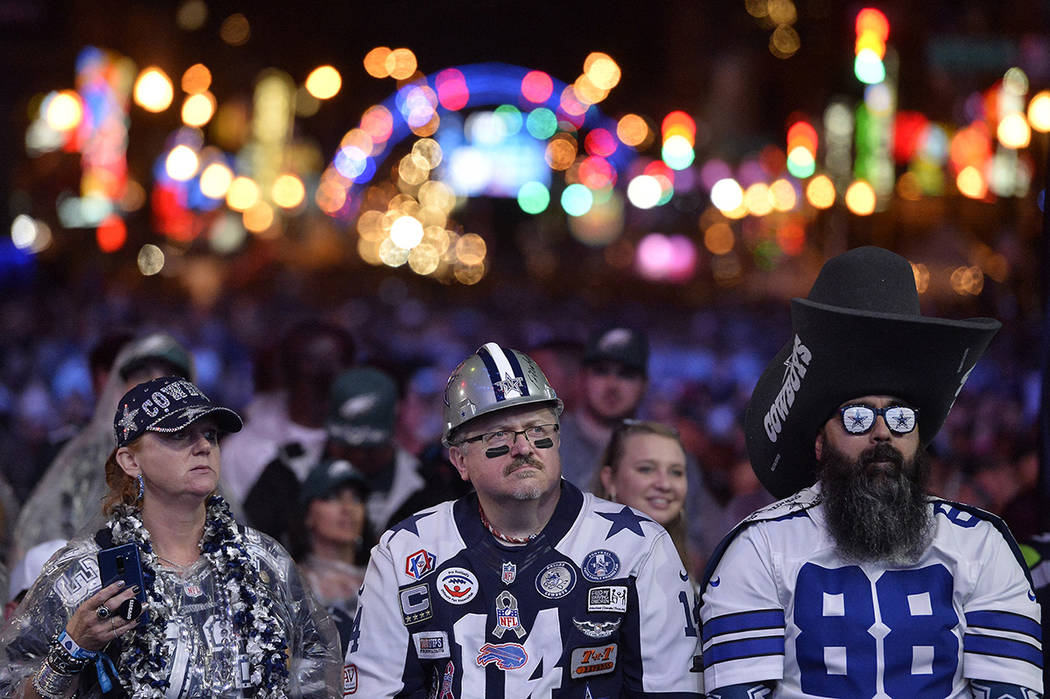 Dallas Cowboys fans watch attend the 2019 NFL Draft Thursday, Apr. 25, 2019, in Nashville, Tenn ...