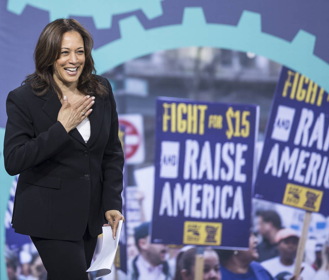 Presidential candidate Sen. Kamala Harris, D-Calif., walks on stage during ÒNational Forum ...