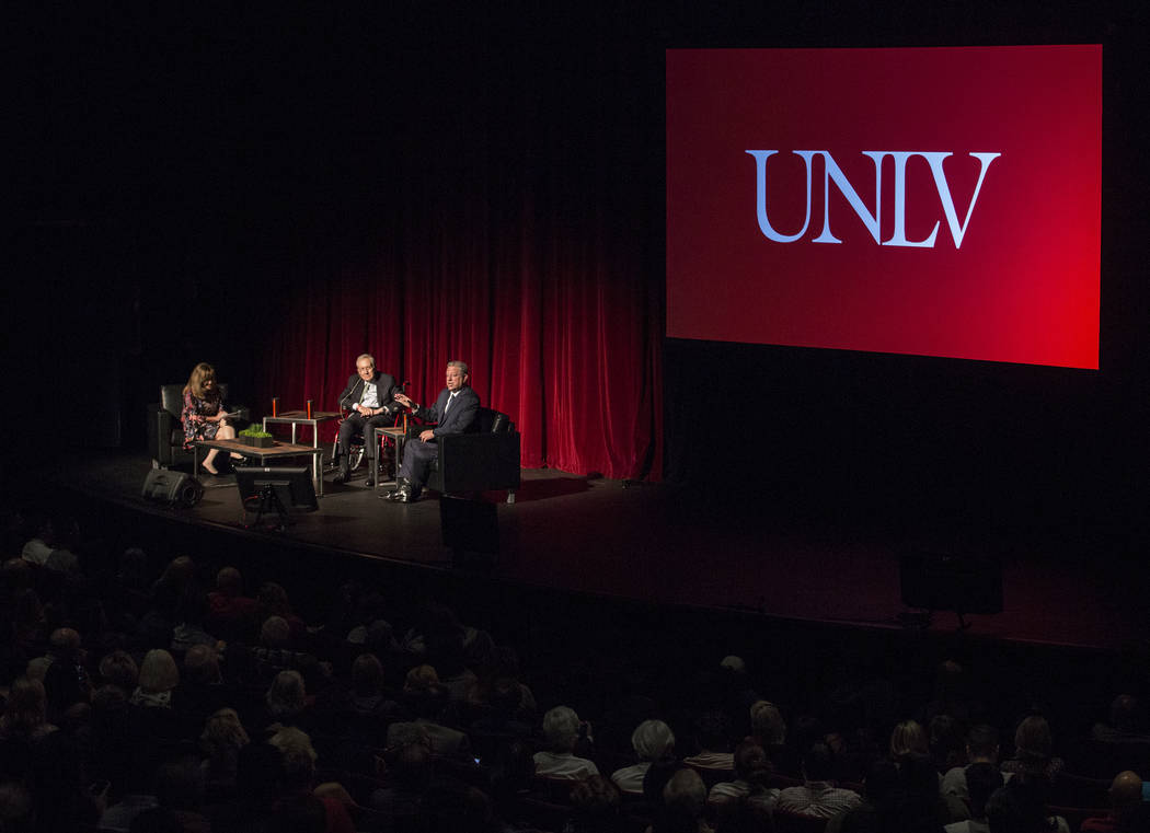 Former U.S. Vice President Al Gore, top/right, discusses climate change with former Sen. Harry ...